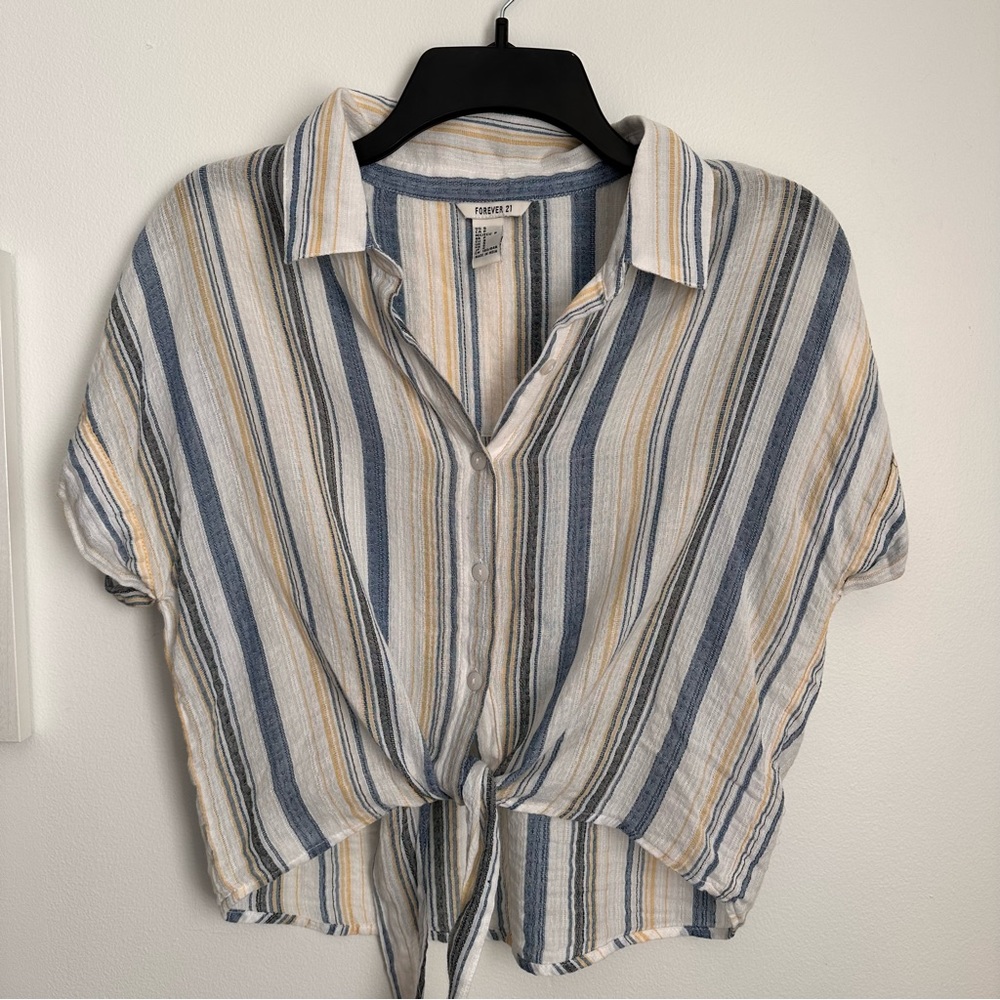 Lightweight button down shirt with tie front. Swim coverup.